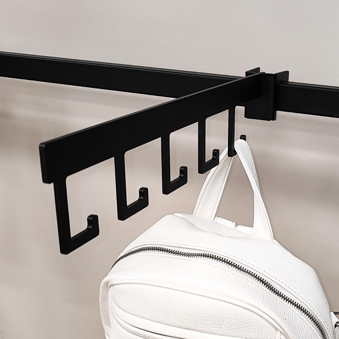 Εξάρτημα κρέμασης τσαντών σε μπάρα